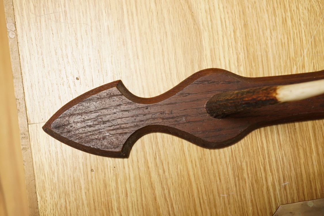 A pair of antler gun racks, 70cm high